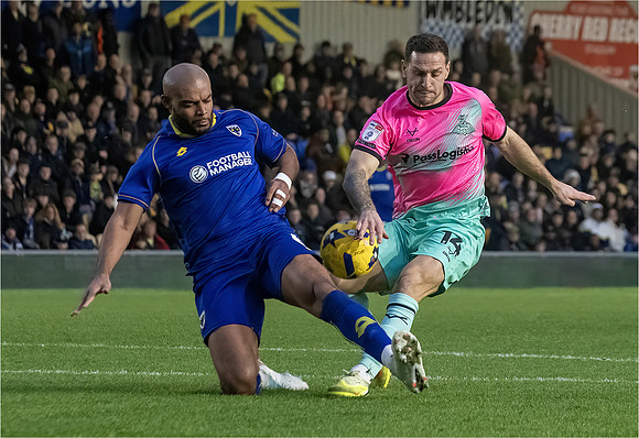 Caroline Brouwer_Wimbledon's Johnson tackles Doncaster's Sharp